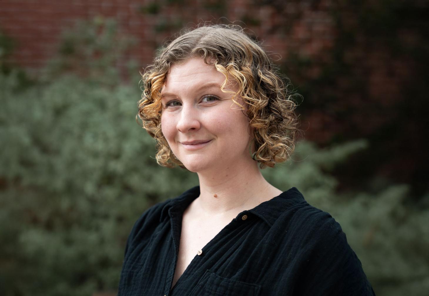 Smiling headshot of Hannah Stuwe on campus