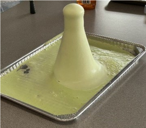 Elephant toothpaste on tray.