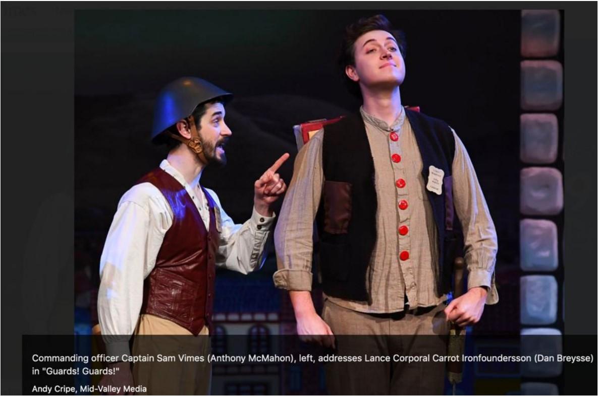 Two men dressed up in a play.
