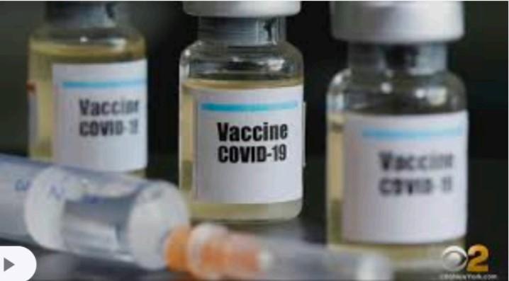 COVID vaccination in bottle.