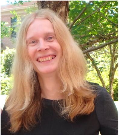 Woman smiling at camera.