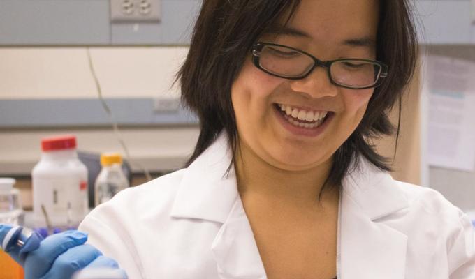 Tricia Chau working with samples in lab
