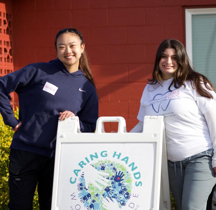 Students pose for a picture during free dental event.